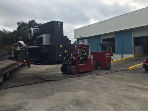 pedowitz-machinery-movers-south-florida-moving-an-amada-turret-punch-press-2-1.jpg