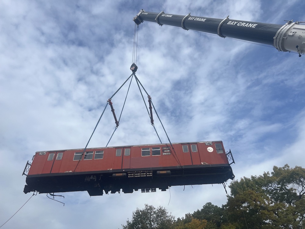 Pedowitz Machinery Movers NYC Trucking Rigging Company Moving Redbird Antique Railcars New York to New Jersey old 7 train vintage 4