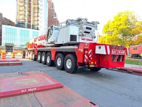 Pedowitz Machinery Movers NYC Trucking Rigging Company Moving Redbird Antique Railcars New York to New Jersey old 7 train vintage 7